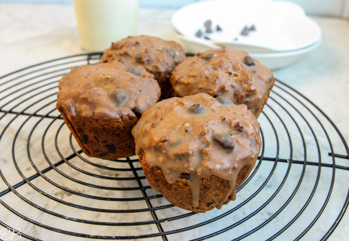 4 muffins on rack with set glaze