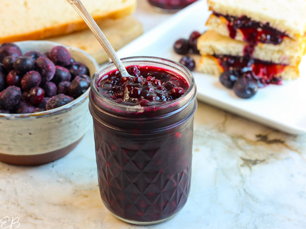 spoon in blueberry jam jar