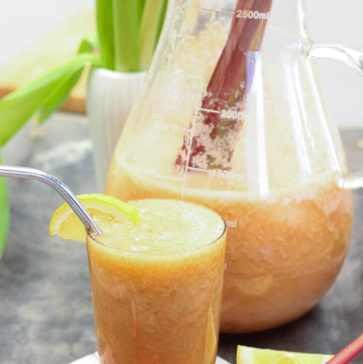 glass and pitcher of rhubarb lemonade