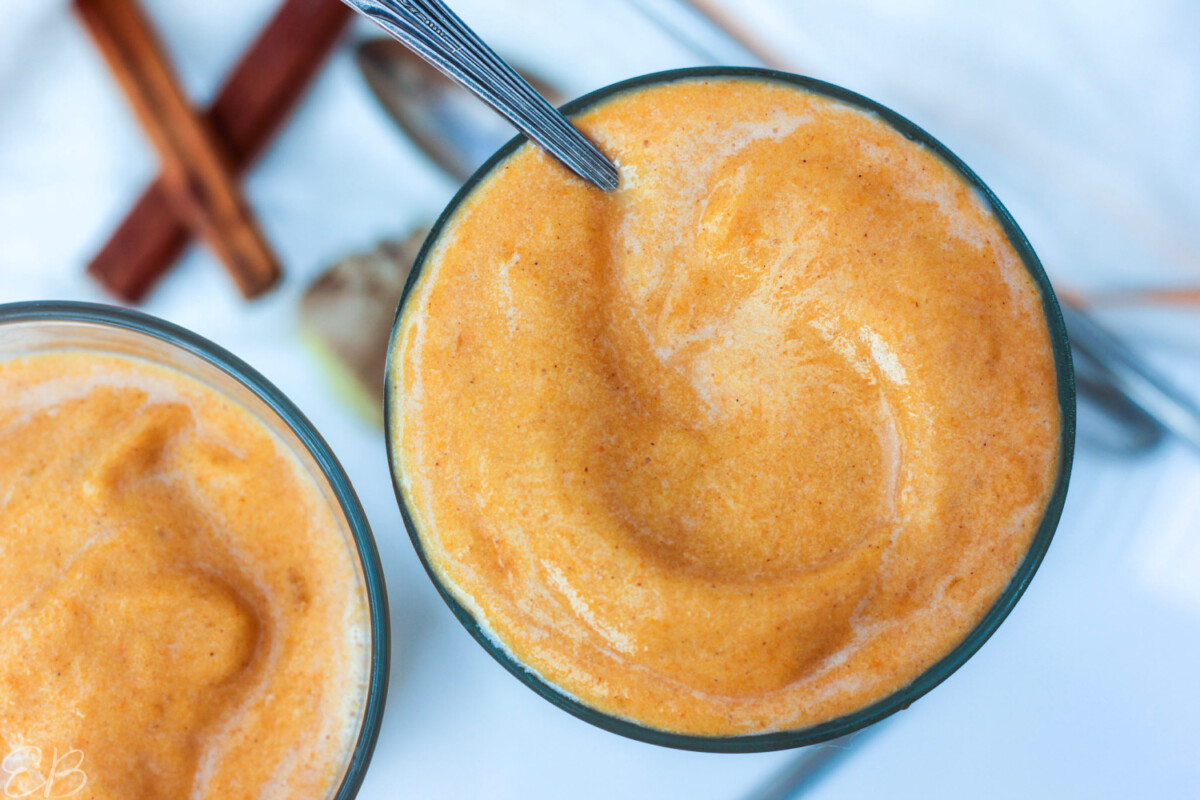 overhead look at yummy slushy creamy texture of carrot smoothie