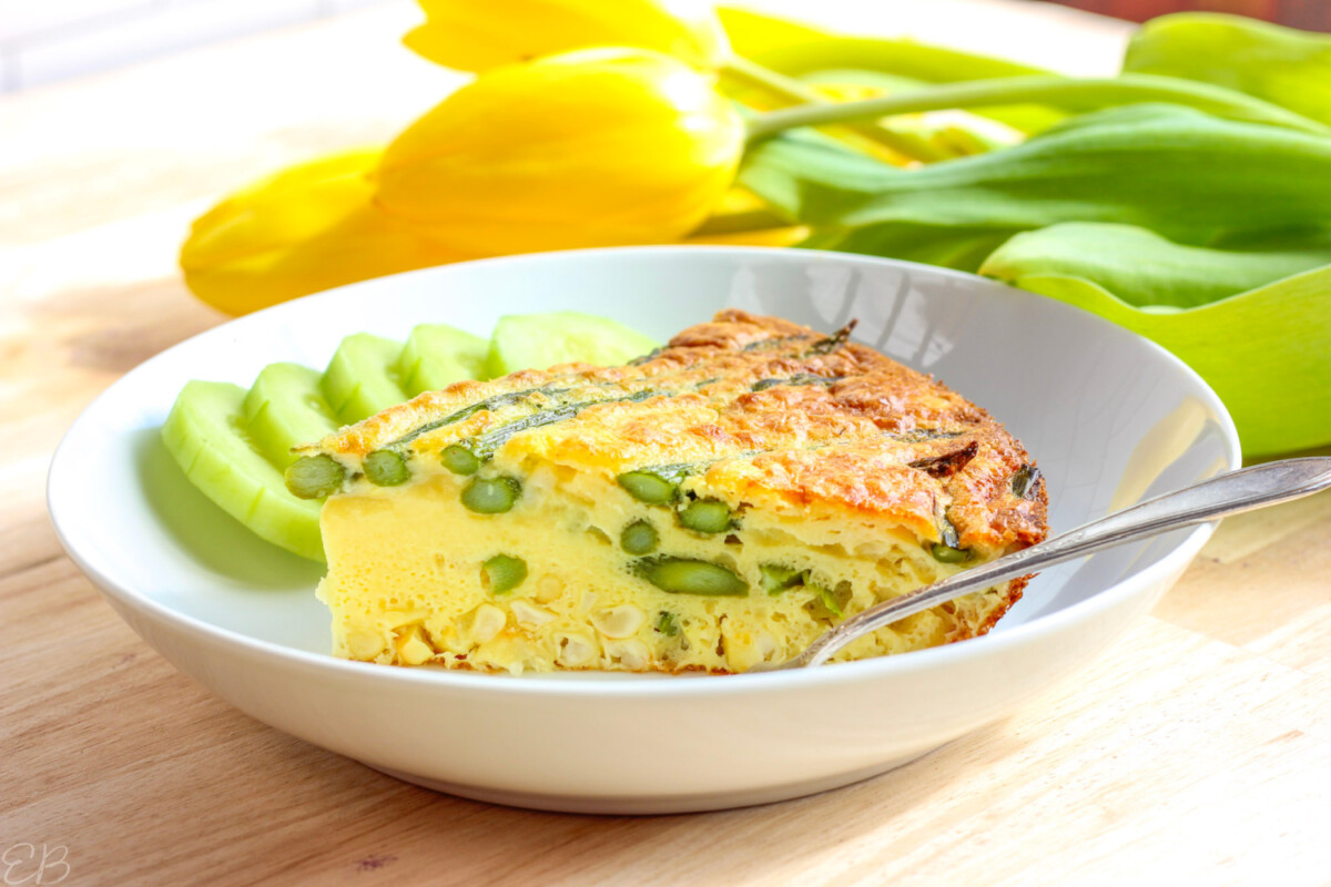 one slice of low oxalate quiche on white dish