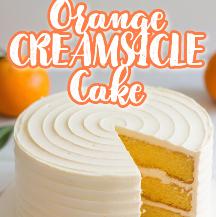 3 layer orange creamsicle cake with one slice removed and title of cake overlay