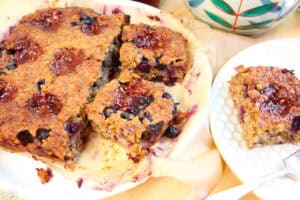 freshly baked peanut butter and jelly baked oatmeal cut into squares to serve