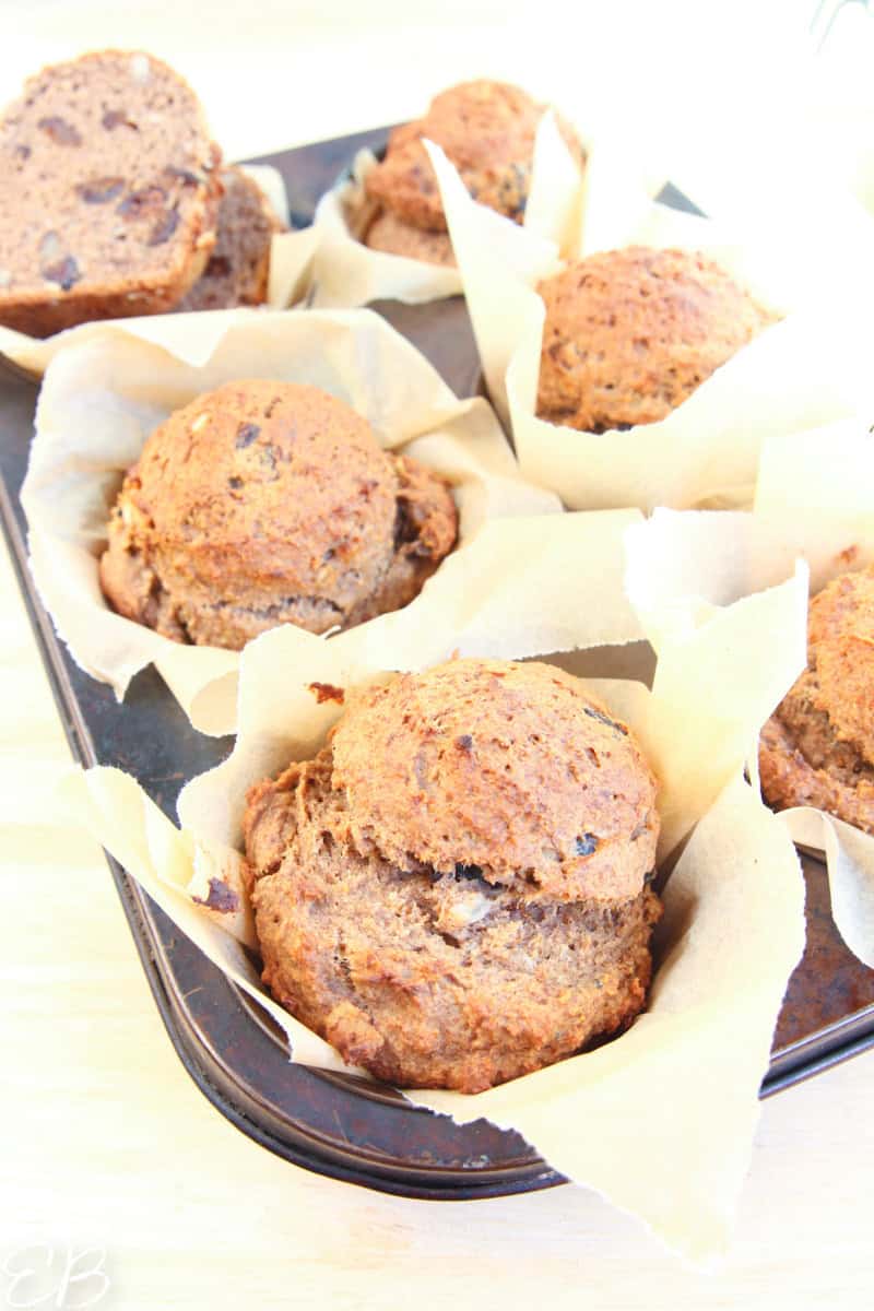 6 high calcium banana muffins in muffin pan, freshly baked and jumbo