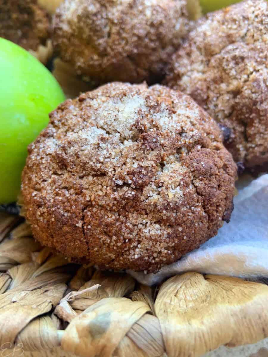 paleo apple cinnamon muffin up close, with sugared top