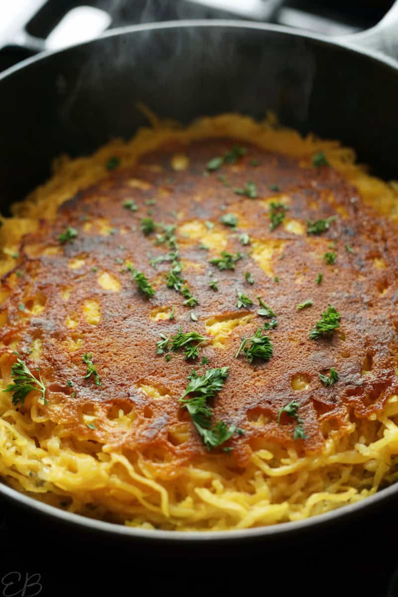 UP CLOSE photo of spaghetti squash pancake just after cooking in pan