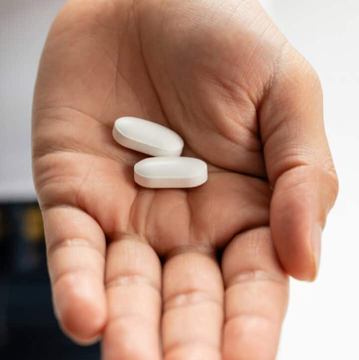 ibuprofen in someone's palm