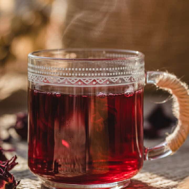 rosebud hibiscus tea in clear mug