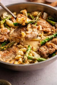 scooping up and serving dairy free marry me chicken