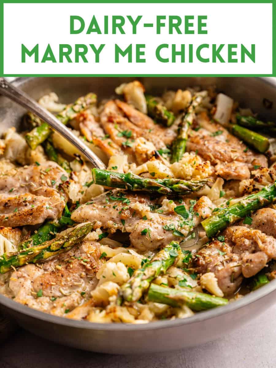 a serving spoon scooping up dairy free marry me chicken from the pan