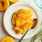 gluten free and paleo fresh peach cake served on small white plate