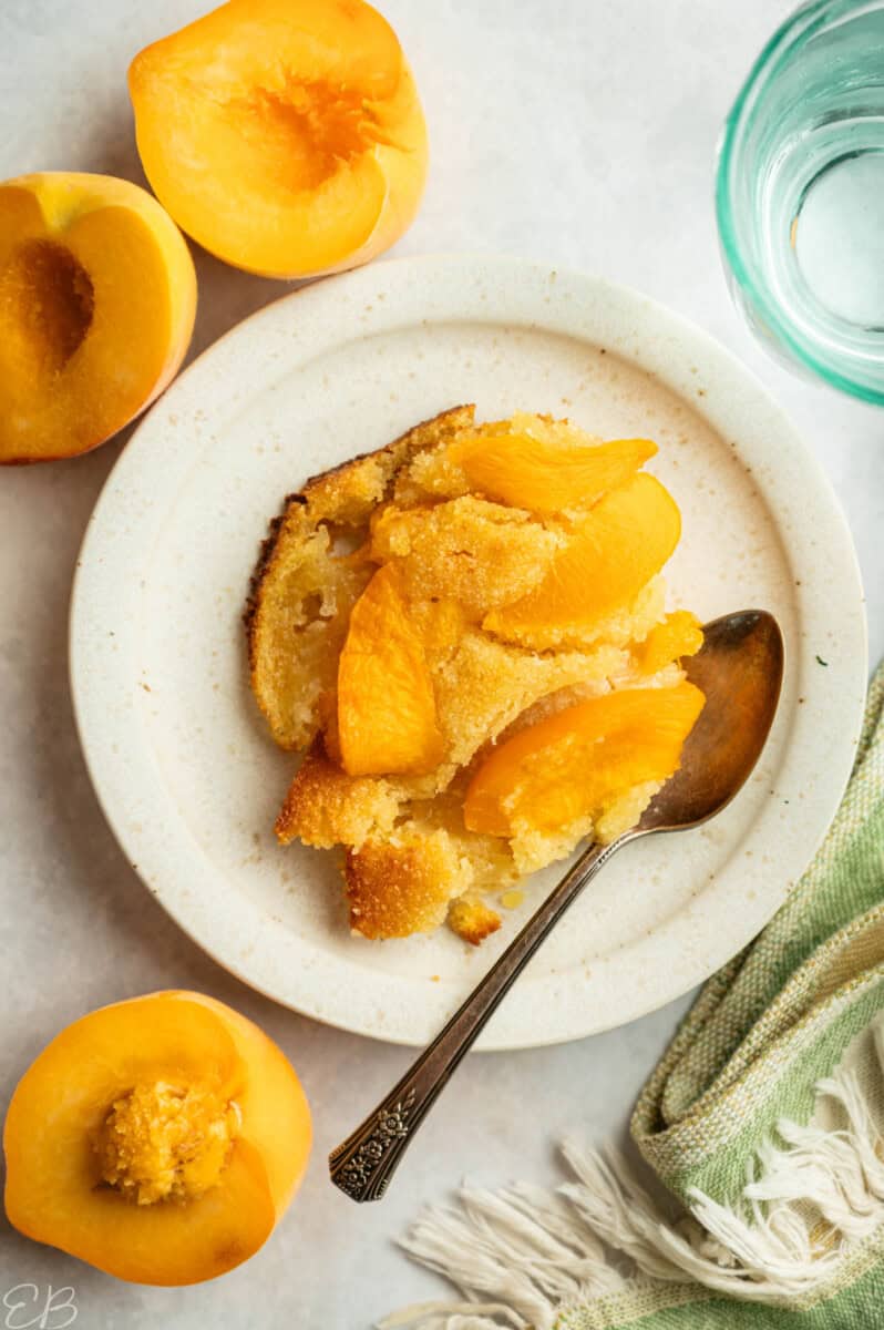 gluten free and paleo fresh peach cake served on small white plate