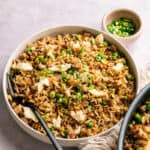 healthy turkey fried rice served in a big dish with fork