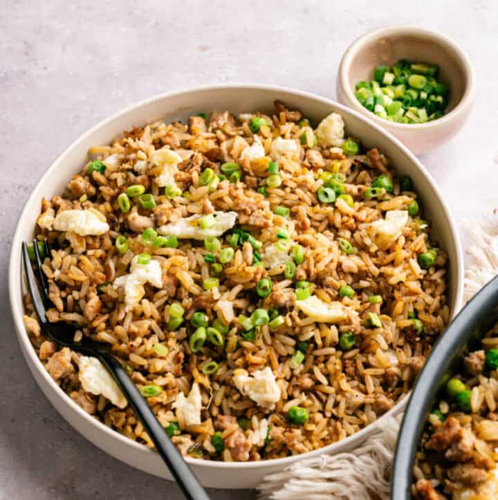 healthy turkey fried rice served in a big dish with fork