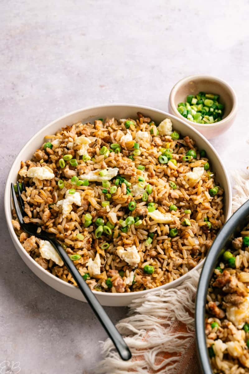 healthy turkey fried rice served in a big dish with fork