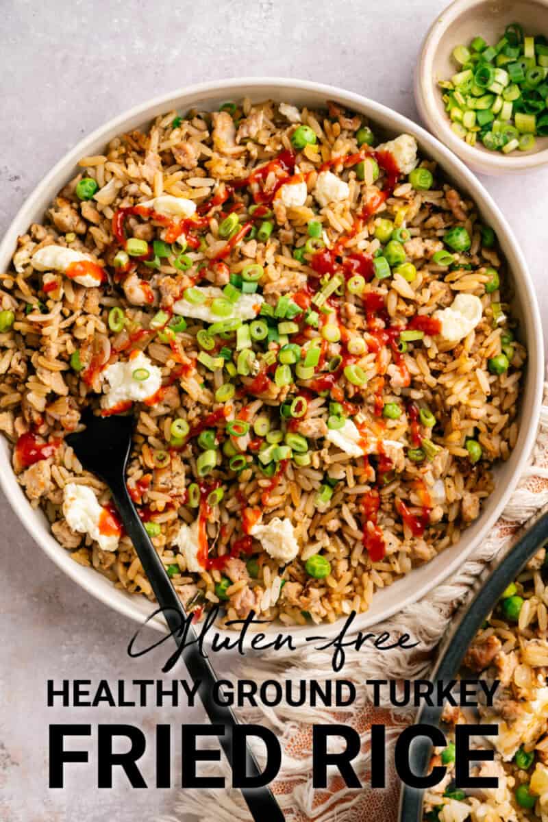 healthy gluten free ground turkey fried rice with chili sauce garnish