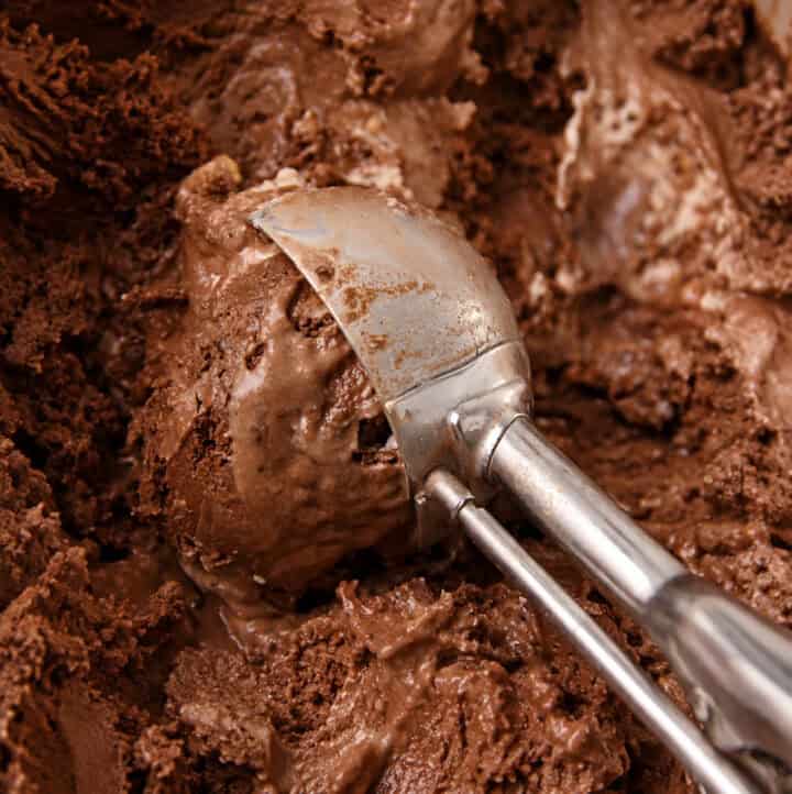 process photo of scooping 4 ingredient chocolate ice cream (paleo, keto, vegan, dairy-free) to serve it