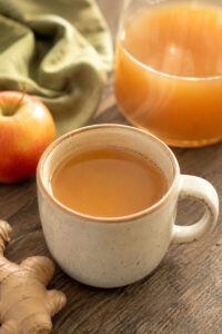 apple ginger tea served hot in a mug, like apple cider