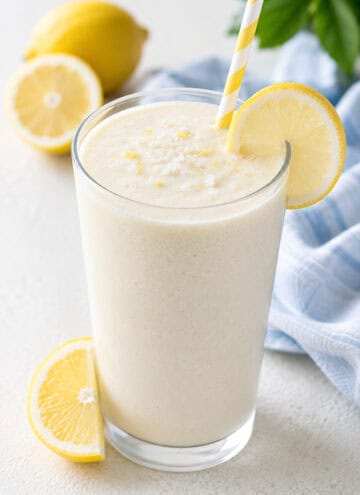 salted lemonade smoothie in clear glass with straw