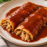 close up image of enchiladas with sauce made from bone broth or meat stock