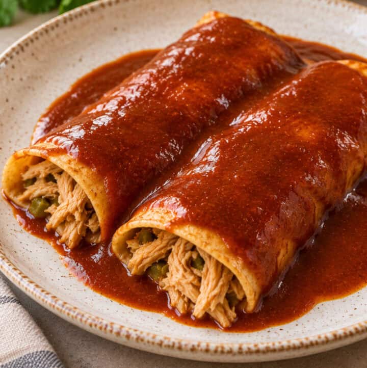 close up image of enchiladas with sauce made from bone broth or meat stock